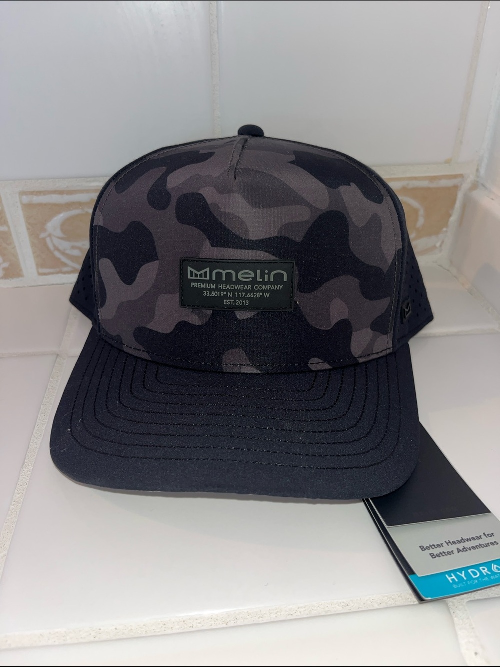 Melin | Black & Charcoal Camo Trucker Hat